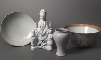 a small bowl and a small bowl sitting next to each other