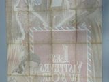a poster on the wall of a building with a picture of a man and a woman