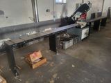 an image of a workbench in a factory with a lot of tools