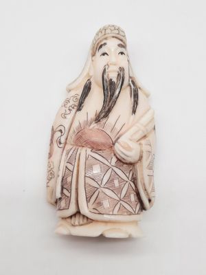 chinese carved ivory figurine of an old man with a beard