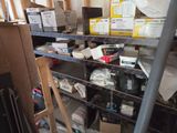 many boxes and boxes on the shelves in the room