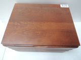 a wooden box that has a price tag on it
