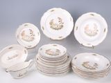 a lot of plates that are sitting on a table