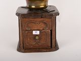 a vase that is sitting on top of a wooden box
