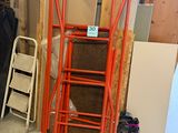 a ladder that is next to a wall in a room