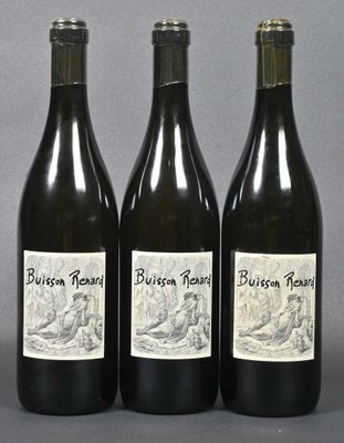 three bottles of wine sitting on top of a table next to each other