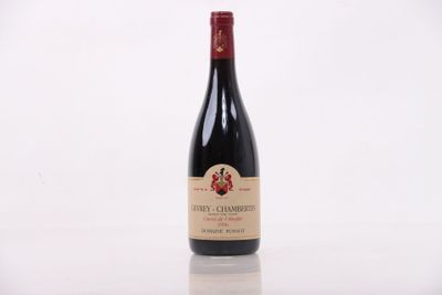 a bottle of wine that is sitting on a table