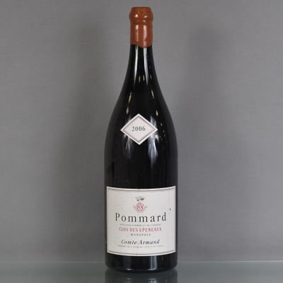 a bottle of wine that is sitting on a table