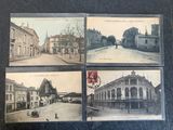 four old postcards of a street in a european city