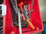 a red box with tools in it in a garage