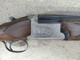 a close up of a shotgun with a gun on it