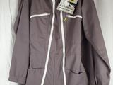the jacket is gray and white with a white stripe on the side