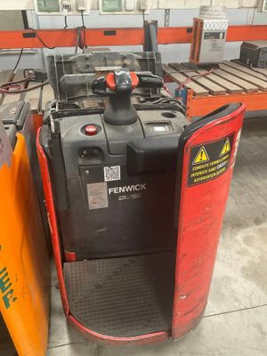 a fork lift truck parked in a warehouse