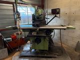 an image of a table saw in a workshop