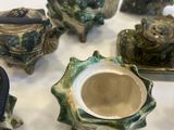 a group of teapots that are sitting on a table