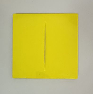 a yellow piece of paper with a black line on it