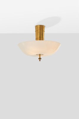 an image of a ceiling light with a white glass shade