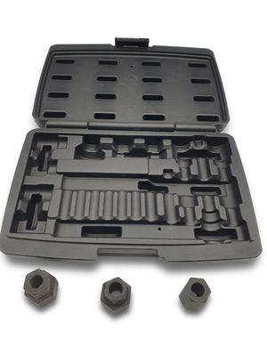 a tool kit in a plastic case on a white surface