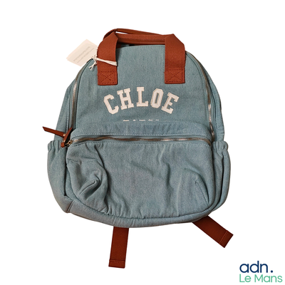 a blue backpack that has a name on it