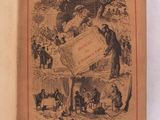 un vieux livre sur lequel figure la photo d'un homme tenant une pancarte