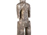 an image of a statue of a man with a hat on his head