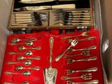 a box with silverware in it on a table