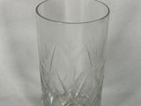 a shot of a glass with a small amount of water in it