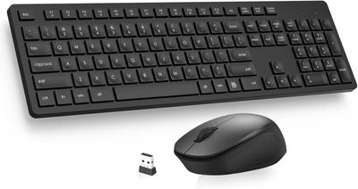 keyboard and mouse on a white surface next to each other