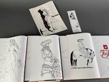 three pages of a book with a drawing of a woman on a horse
