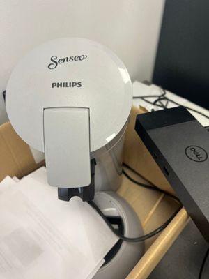a picture of a television antenna and a laptop on a desk