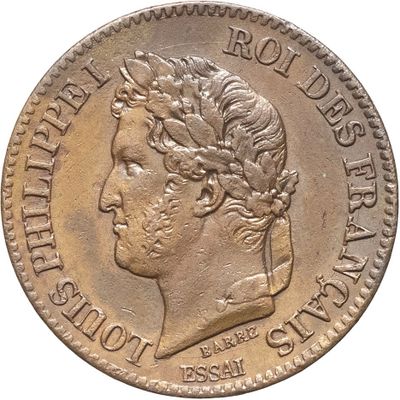 un gros plan d'une pièce de monnaie sur laquelle figure le portrait d'un homme