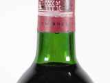 a bottle of wine that is sitting on a table