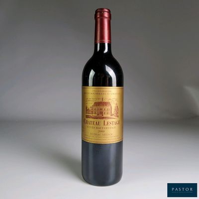 a bottle of wine that is sitting on a table