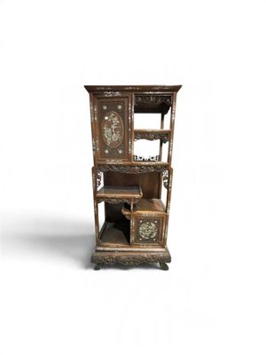 a wooden cabinet with a clock on top of it