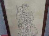 dessin encadré représentant un homme en kimono assis sur une chaise
