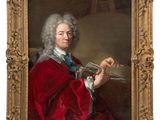 portrait of a man in a red coat holding a pipe