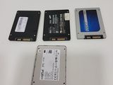three hard drives sitting next to each other on a table