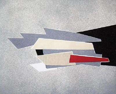 une photo d'une feuille de papier découpée en morceaux