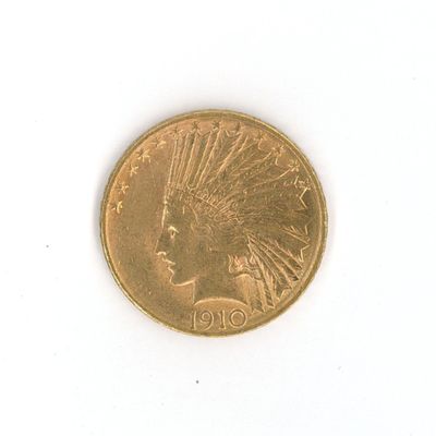 une pièce d'or sur laquelle est représentée une tête d'Indien