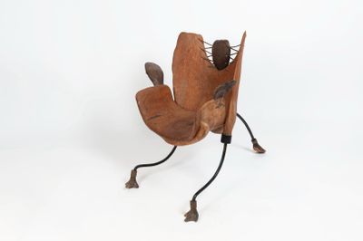 ANONYME (XXe), Fauteuil tripode en métal et bois.