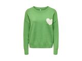 un pull vert avec un cœur blanc sur la poitrine
