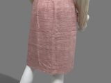 an image of a mannequin wearing a pink skirt and beige blouse