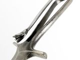 a close up of a metal object with a handle