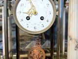 a clock that is sitting on a table in a room