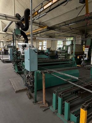 Ligne de vulcanisation de bande caoutchouc sur grillage (AC2) - Photo 1