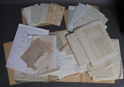 a pile of old papers sitting on top of a table