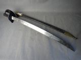 a sword that is laying on a table