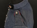 a close up of a uniform on a mannequin head
