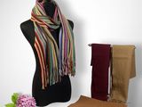 a mannequin with a scarf, scarf, and other items on it