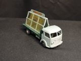 a toy truck with a window on the back of it